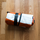 Illustration for article titled This Inflatable Suitcase Made Out of Old Truck Tarps Works Surprisingly Well